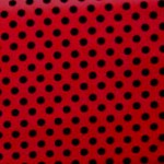 Black spot on red quilting fabric