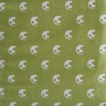 White elephants on green quilting fabric