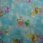 Fairy on blue quilting fabric 